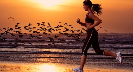 woman running on the beach